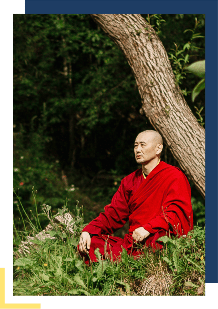 Qigong master having meditation under the tree.